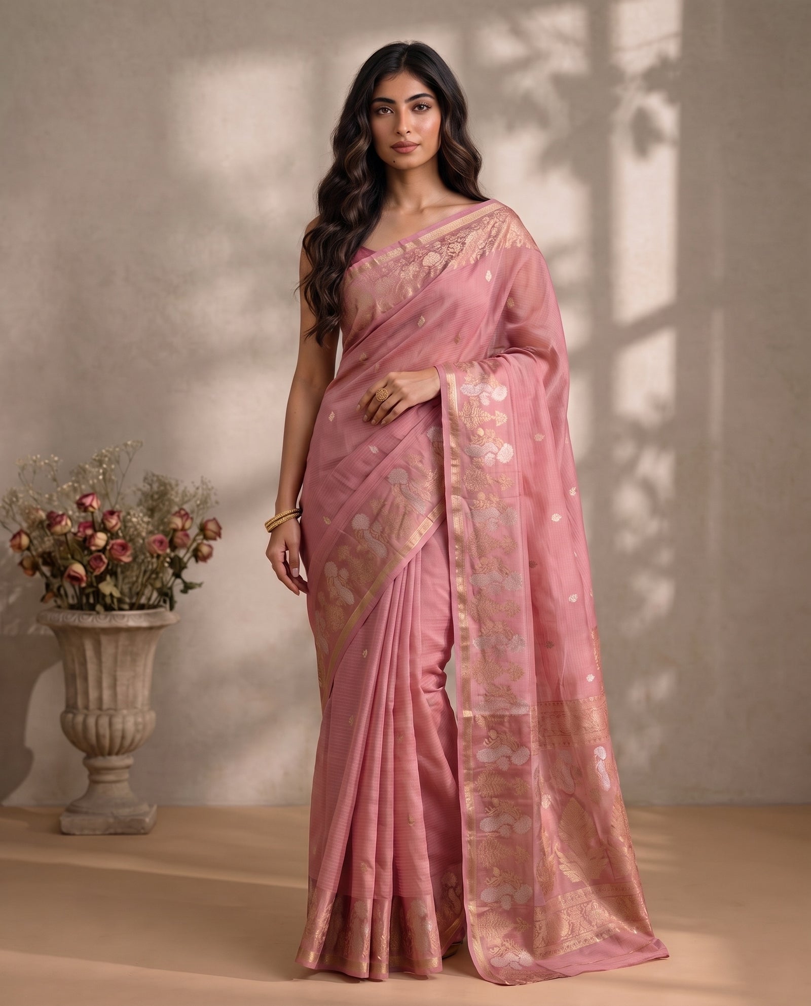 Full drape front view of pink Manipuri Kota saree with zari work