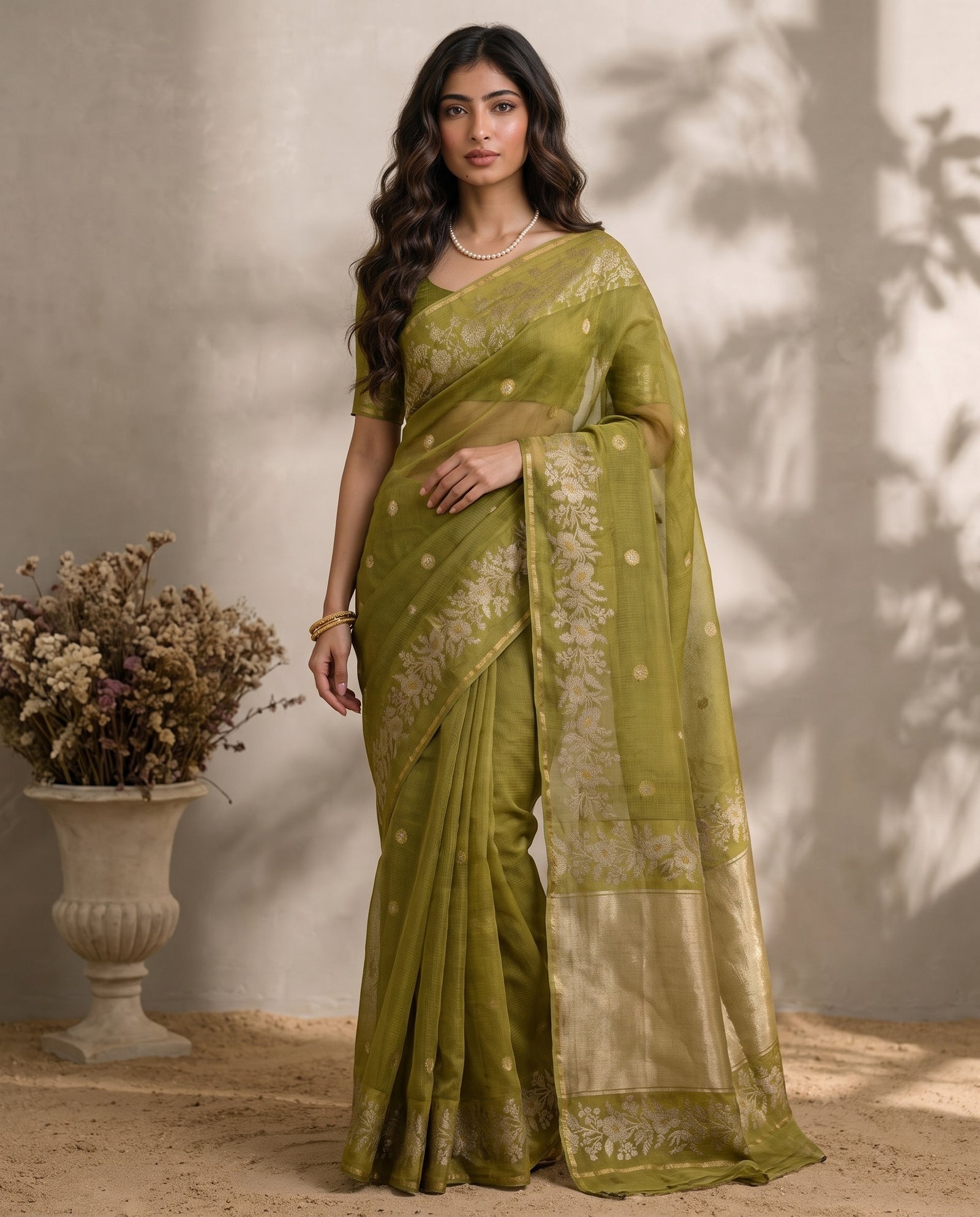 Full drape front view of olive green pure Manipuri Kota saree