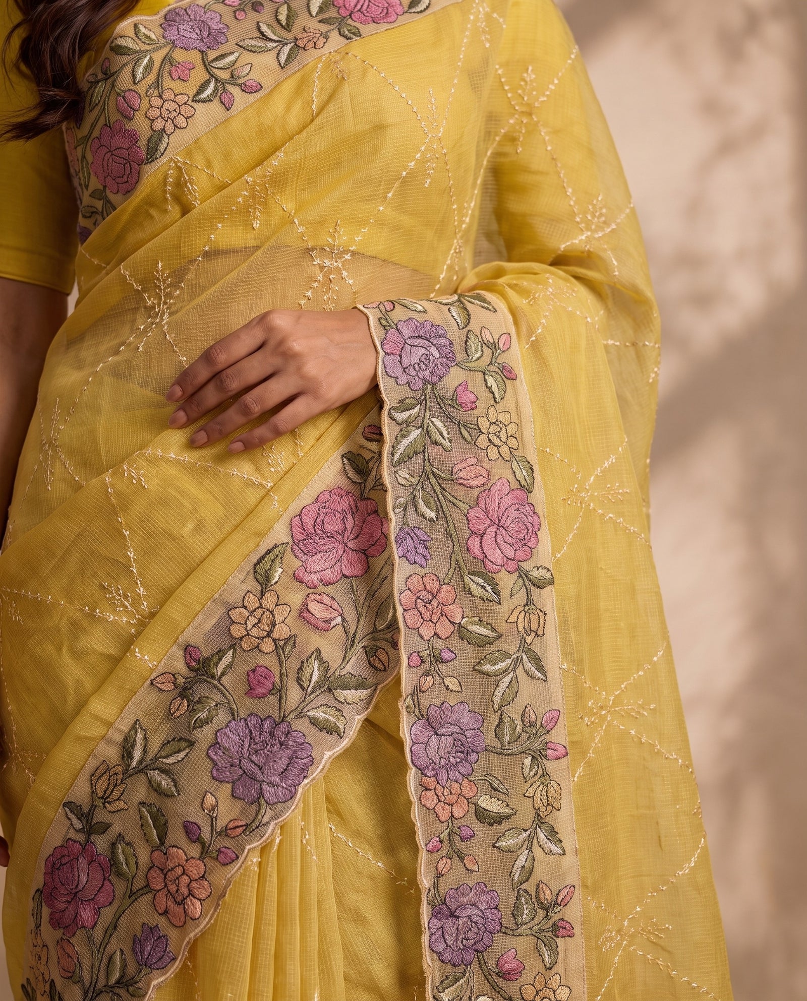 Back view of draped yellow pure kota silk saree