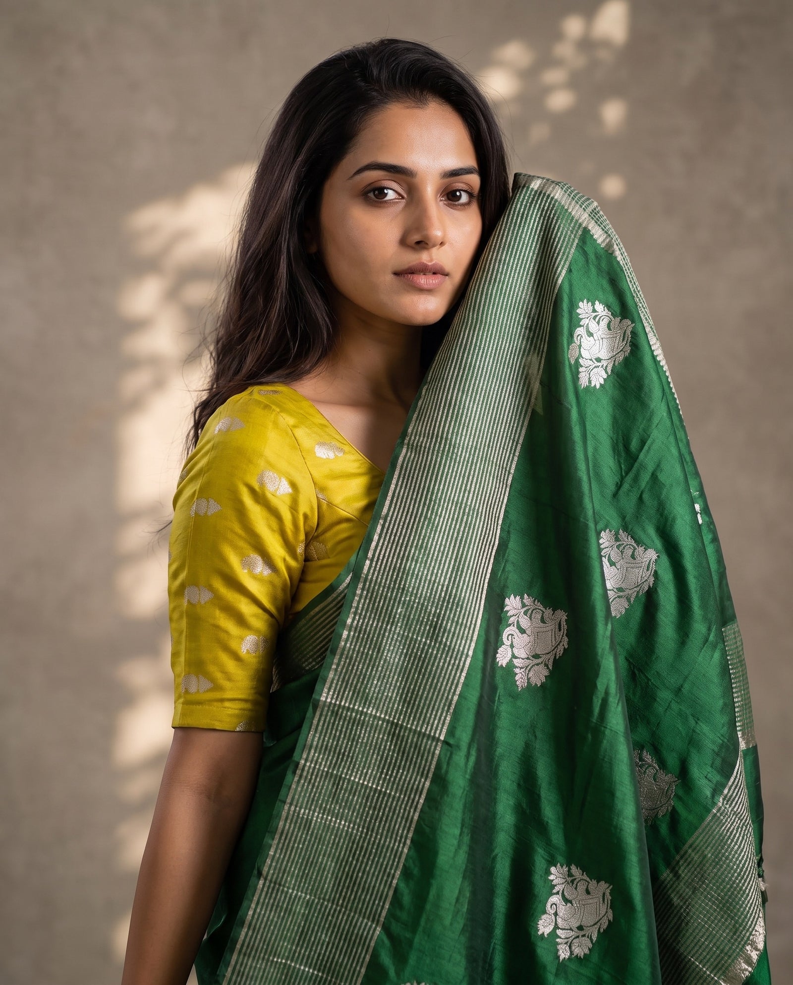 Back drape view of green pure HO silk saree