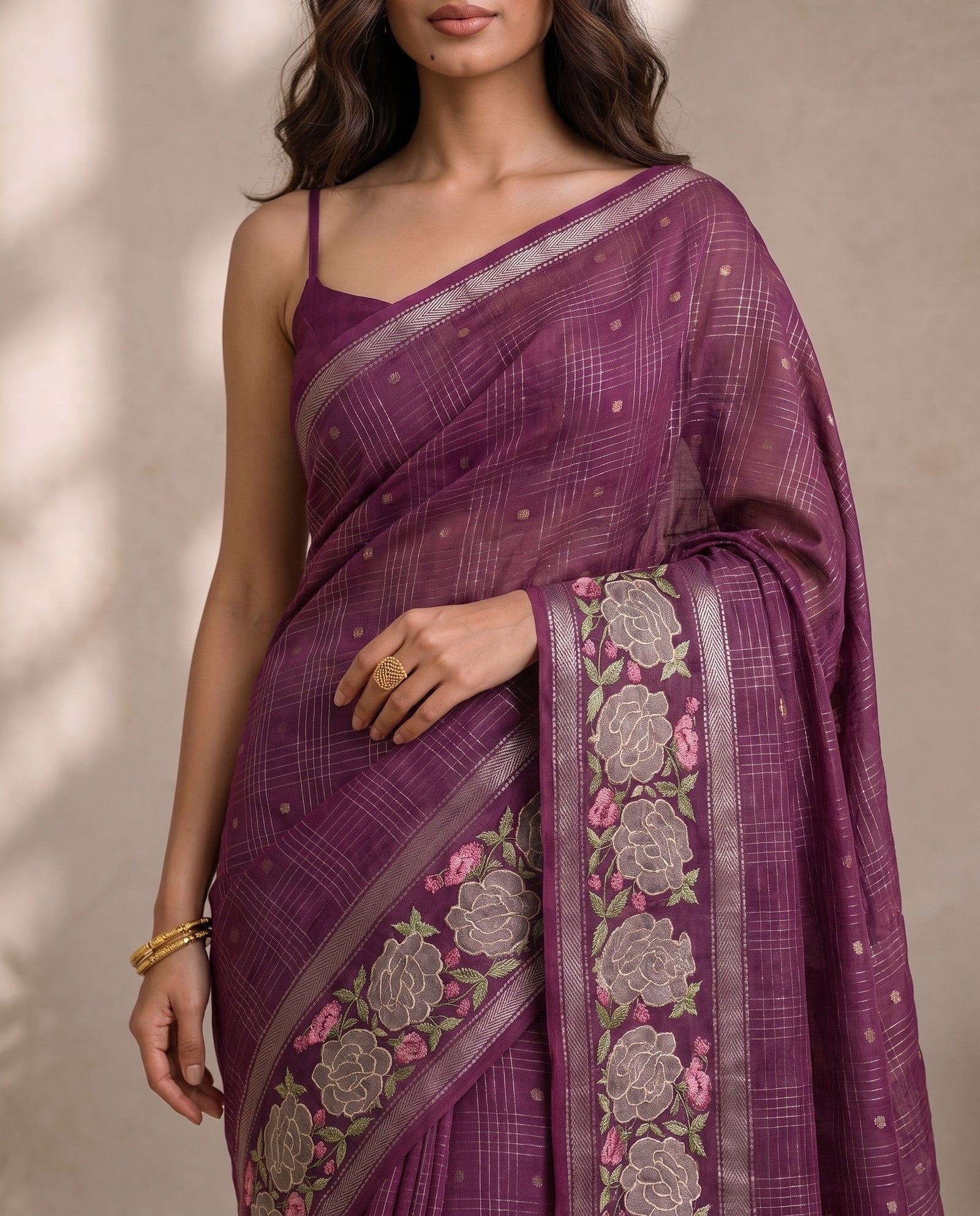 Mid-body crop showing fine grid checks and woven butas on violet cotton