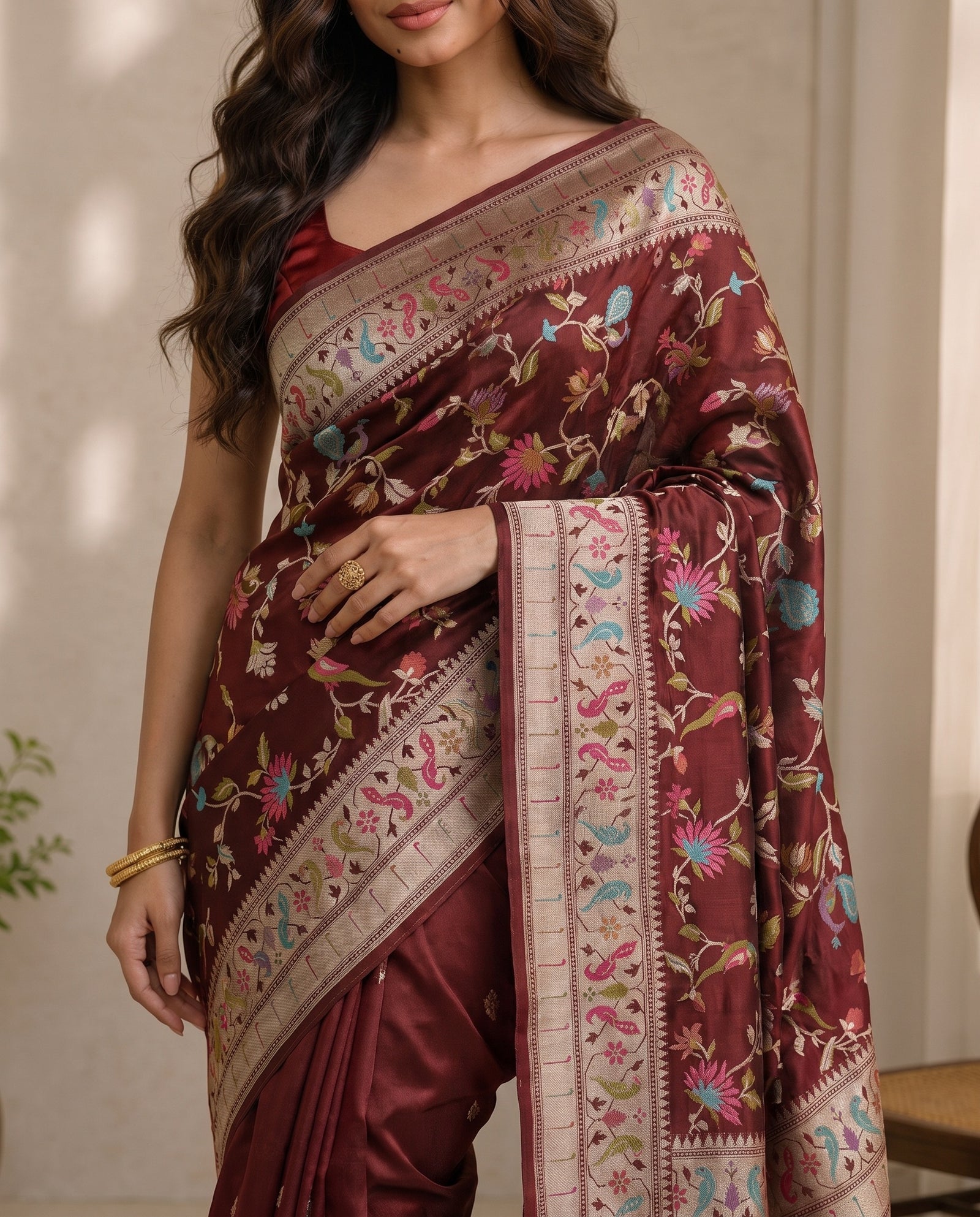 Mid-body crop showing meenakari bird and floral motifs