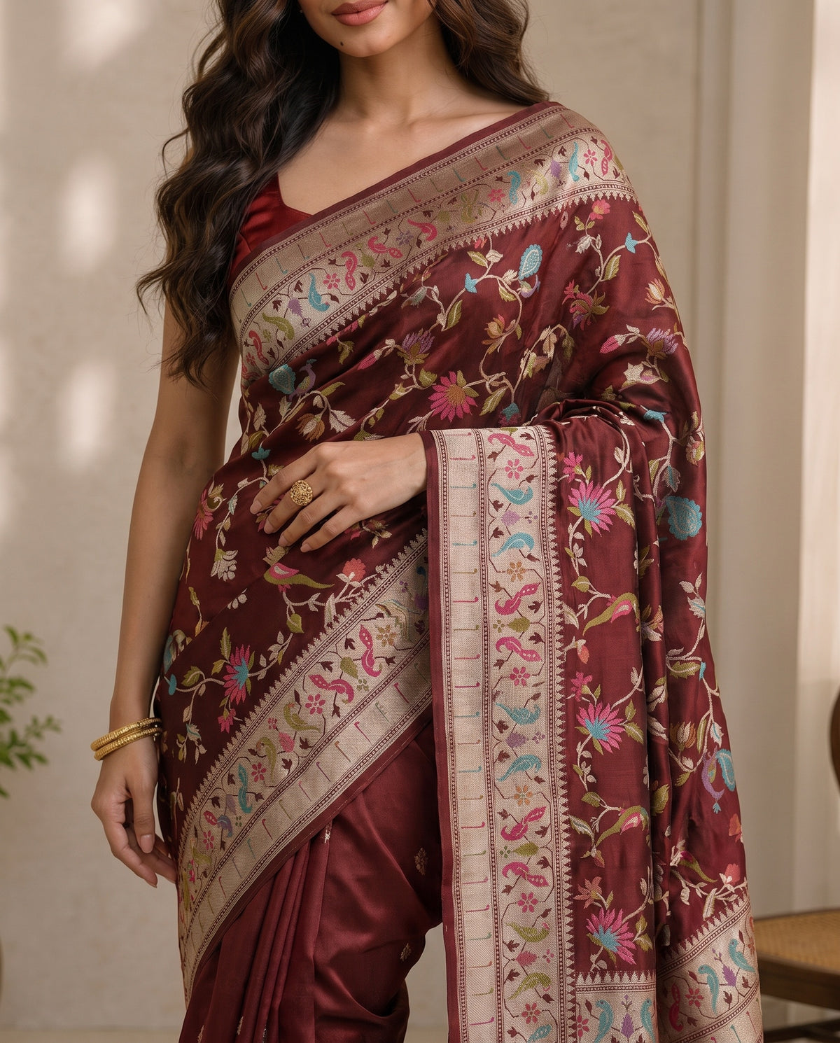 Mid-body crop showing meenakari bird and floral motifs