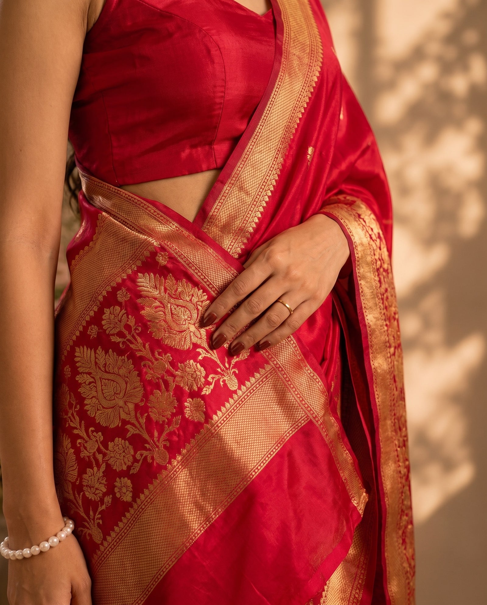Pallu draped over shoulder on Mirchi Red Pure HO Silk saree