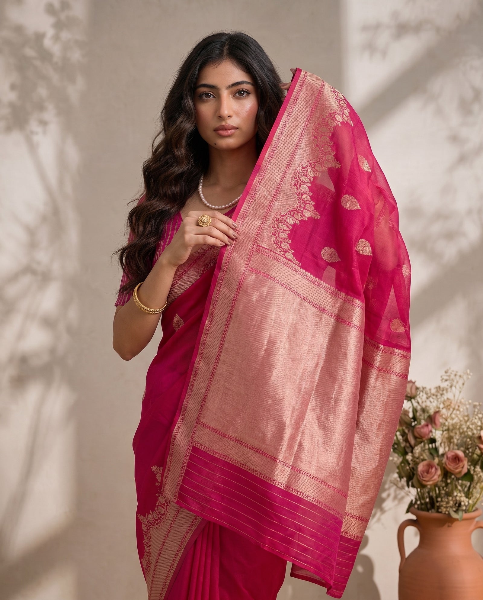 Pallu draped over shoulder showing intricate zari weaving