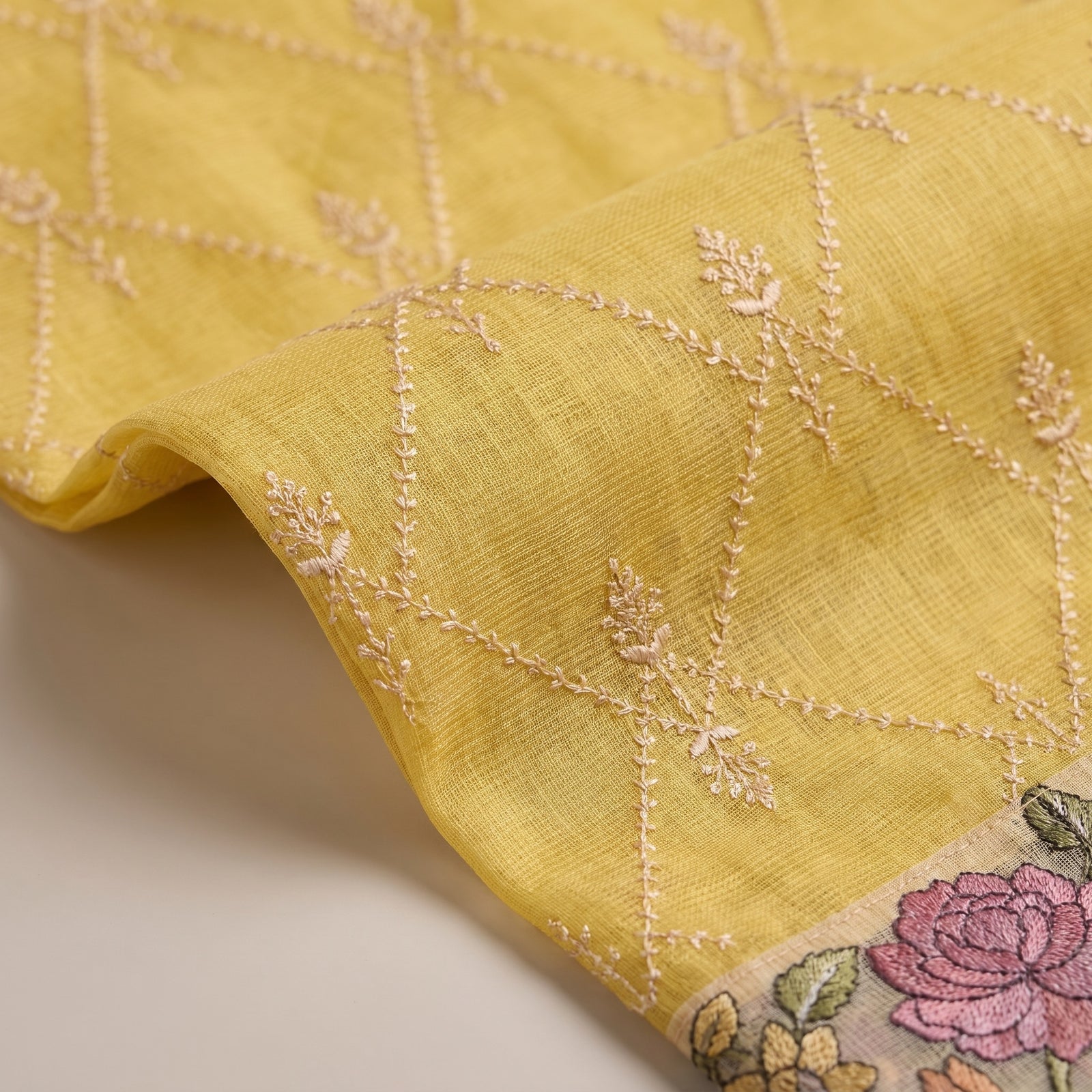 Yellow pure kota silk saree pallu draped over shoulder