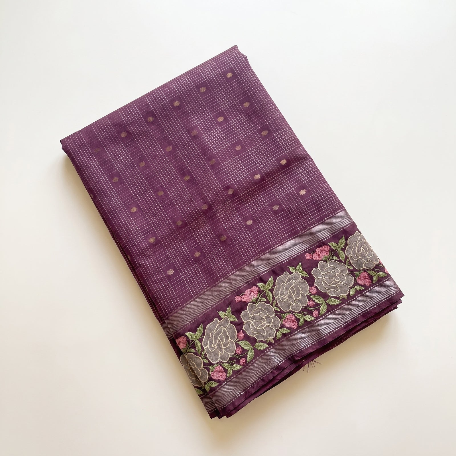Folded violet pure Mangalgiri cotton saree with embroidered floral border