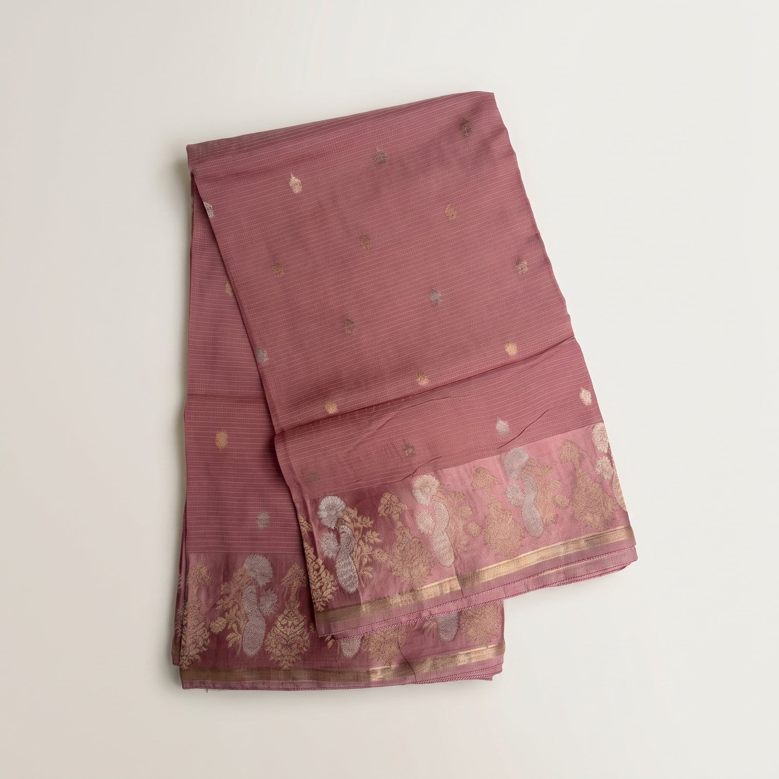 Flat spread of pink Manipuri Kota saree showing pallu and body
