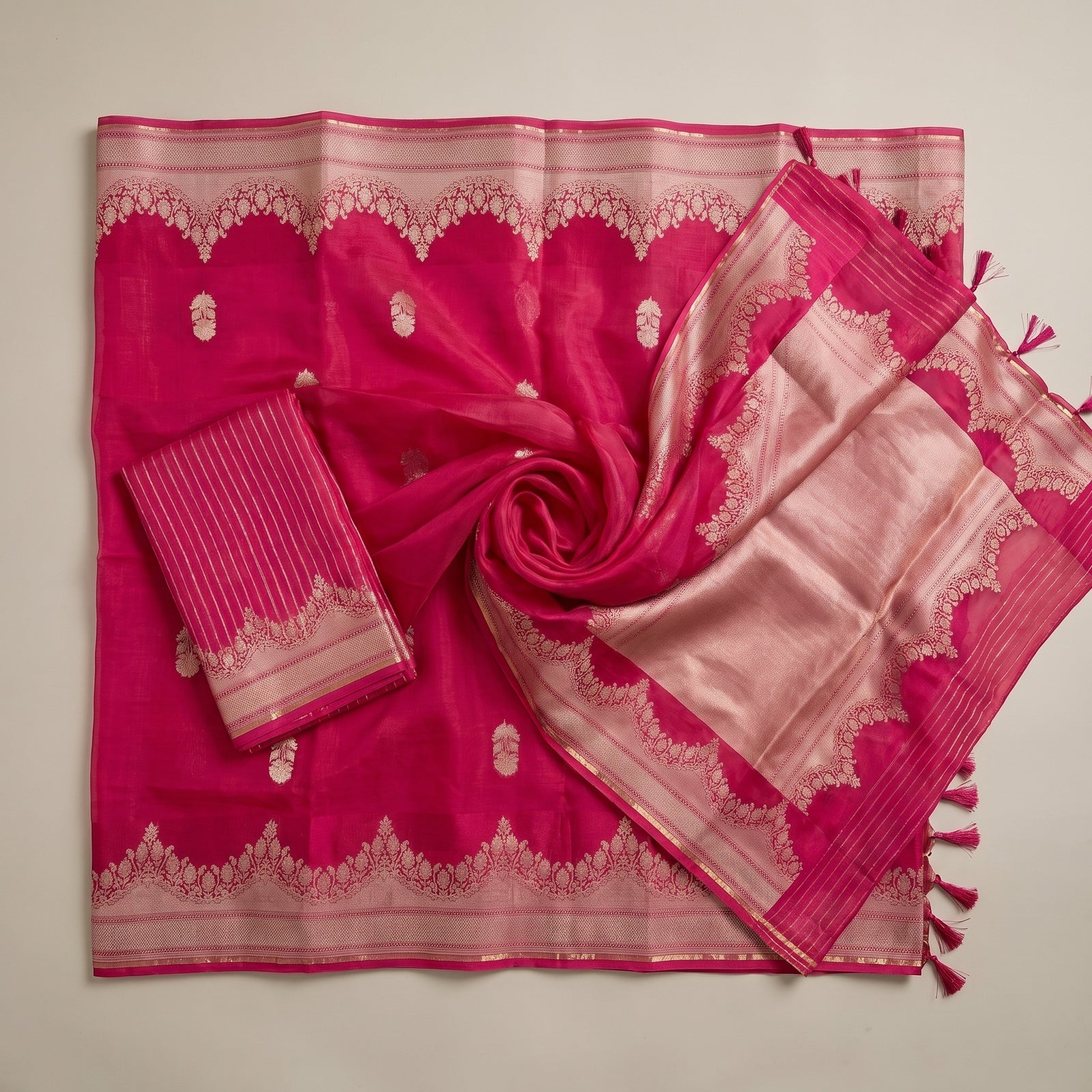 Flat spread view of pink pure kora organza saree with pallu