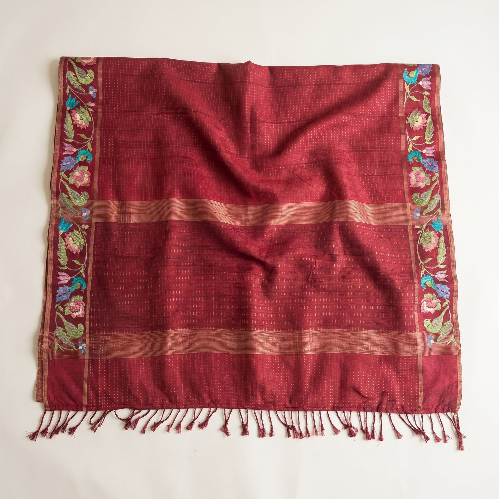 Flat spread of deep pink pure Kosa Tussar saree showing woven vertical bands