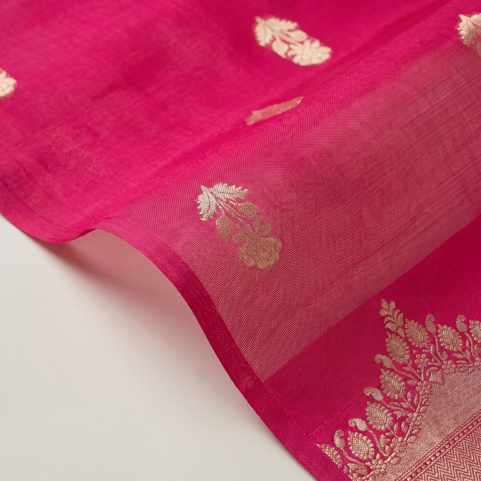 Full pallu spread showing dense zari work and border patterns